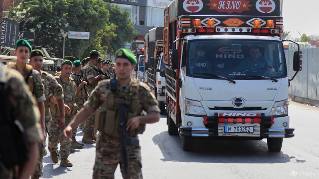 Palestinian factions in Lebanon hand over truckloads of weapons from largest refugee camp