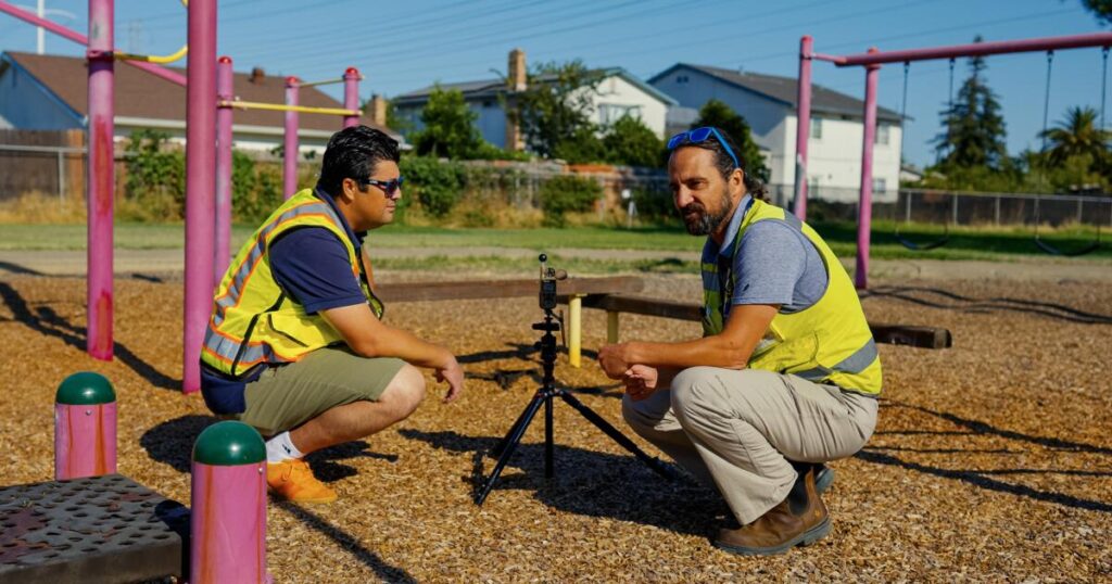 Playgrounds function as backyards for many. They need shade trees