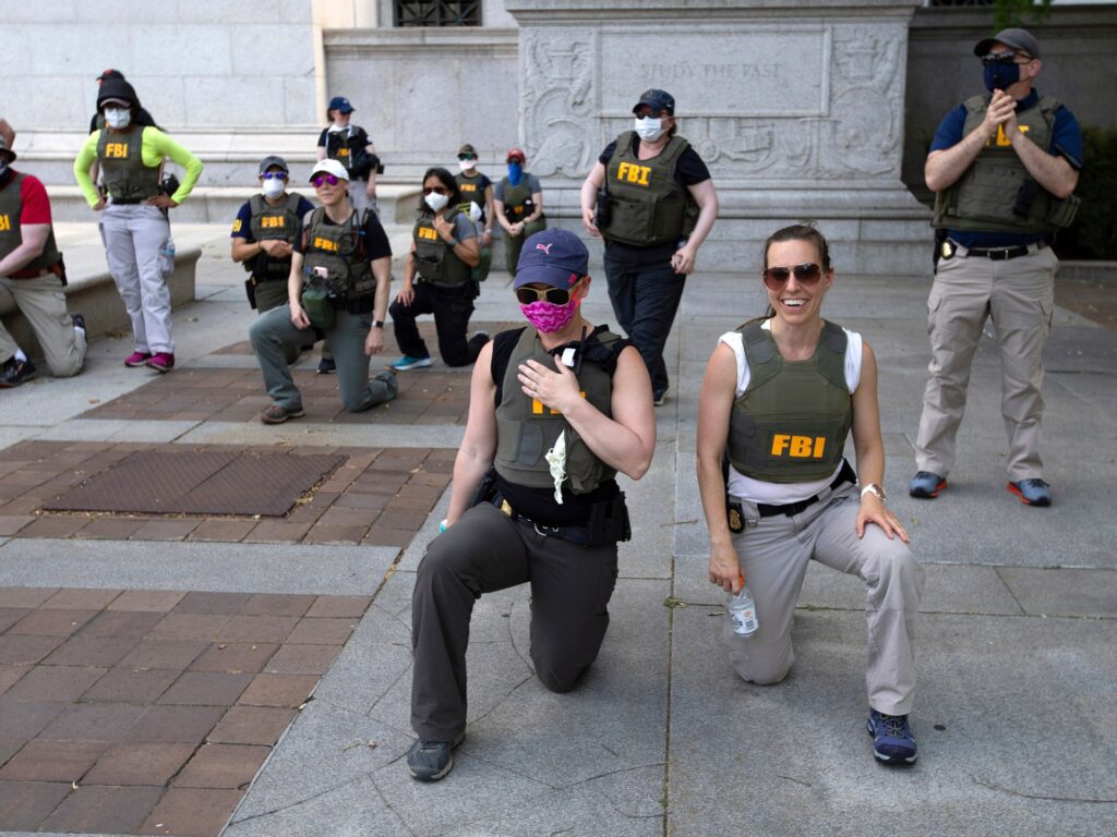 FBI agents allege wrongful termination for kneeling during US protest | Donald Trump News
