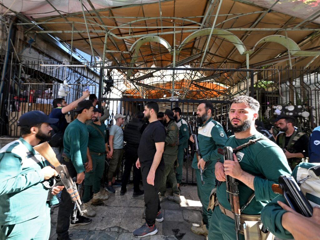Mourners bury victims of Damascus cafe bombing with six lawyers among dead | Conflict News