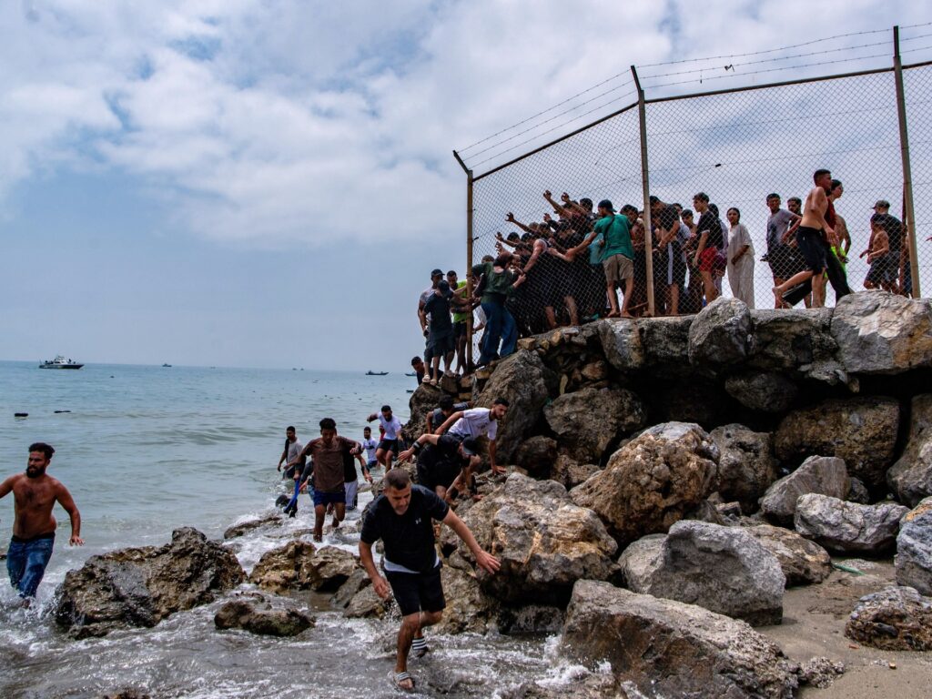 Spain’s enclave Ceuta raises alarm as thousands cross border from Morocco | Migration News
