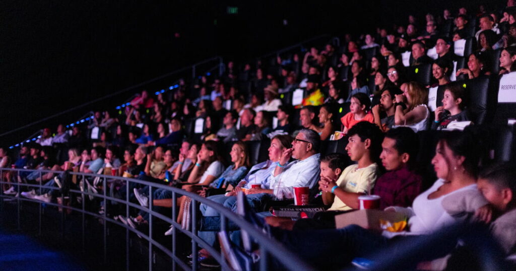 A movie theater patron on his cellphone is pepper-sprayed and people cheered? I get it.