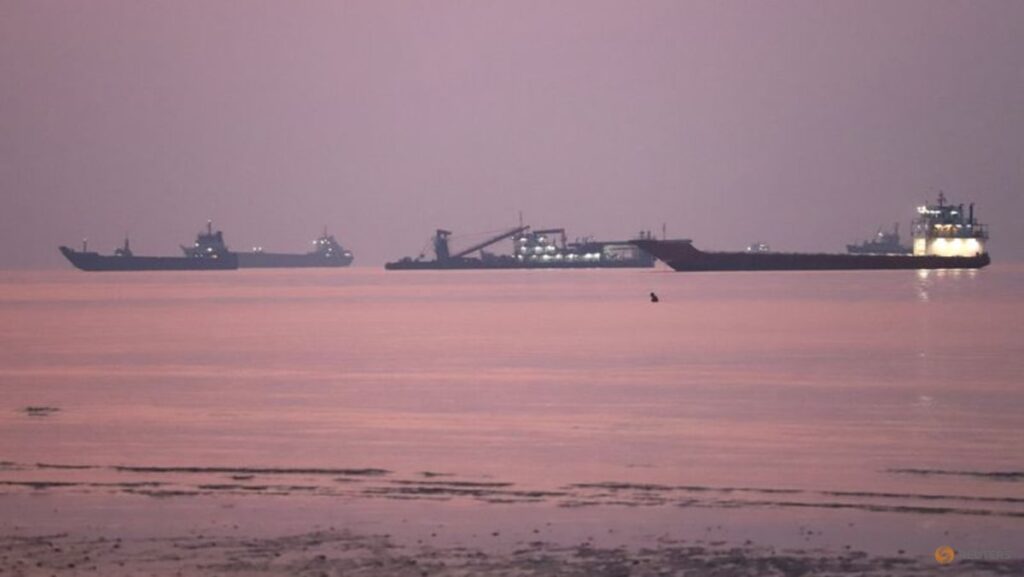 Iran says four tankers on fire after hitting mines in Strait of Hormuz